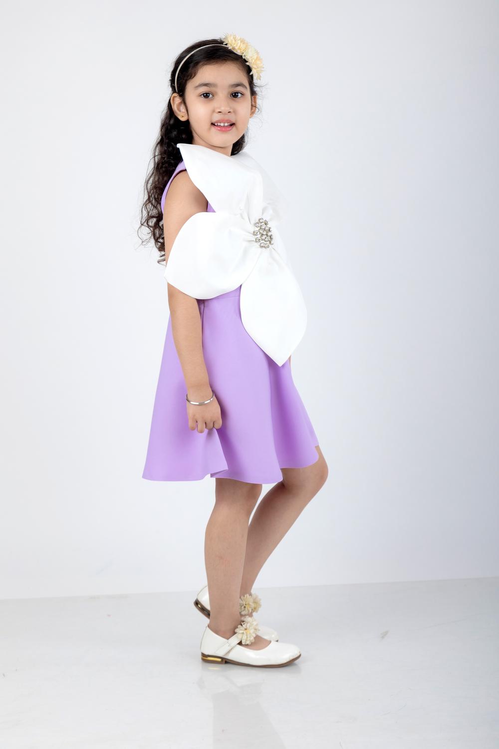 A Line Dress With Big Flower And Stone Detailng In The Center