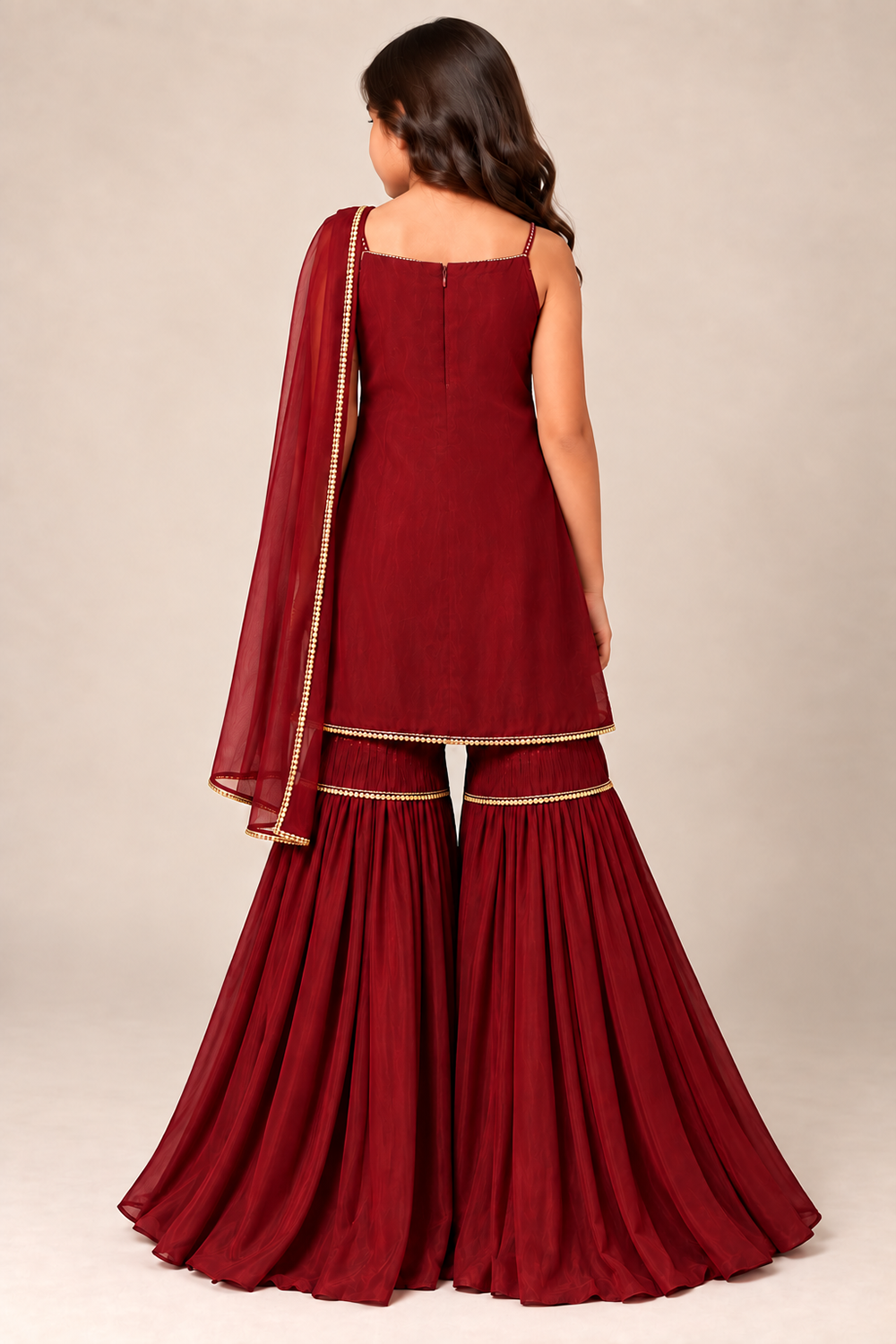 A Rich Maroon Hand Embroidered Suit With Gharara And Laced Dupatta