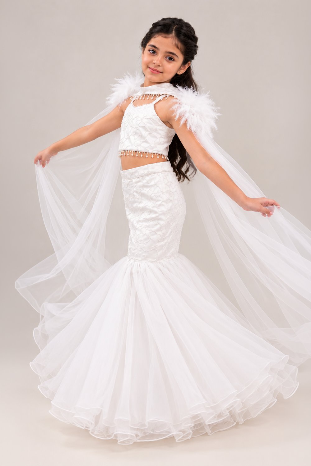 Elegant Fish Cut Lehenga Set Featuring Delicate Embroidery And Dramatic Fur Cape