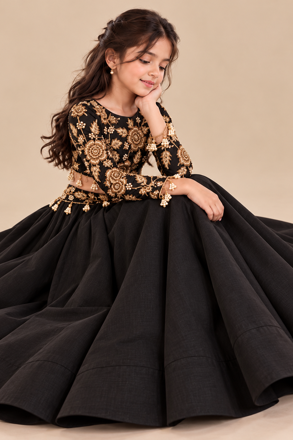 A Luxurious Black Lehenga Set Featuring A Full Sleeved Blouse With Golden Embroidery And Pearl Tassels Paired With Flared Lehenga