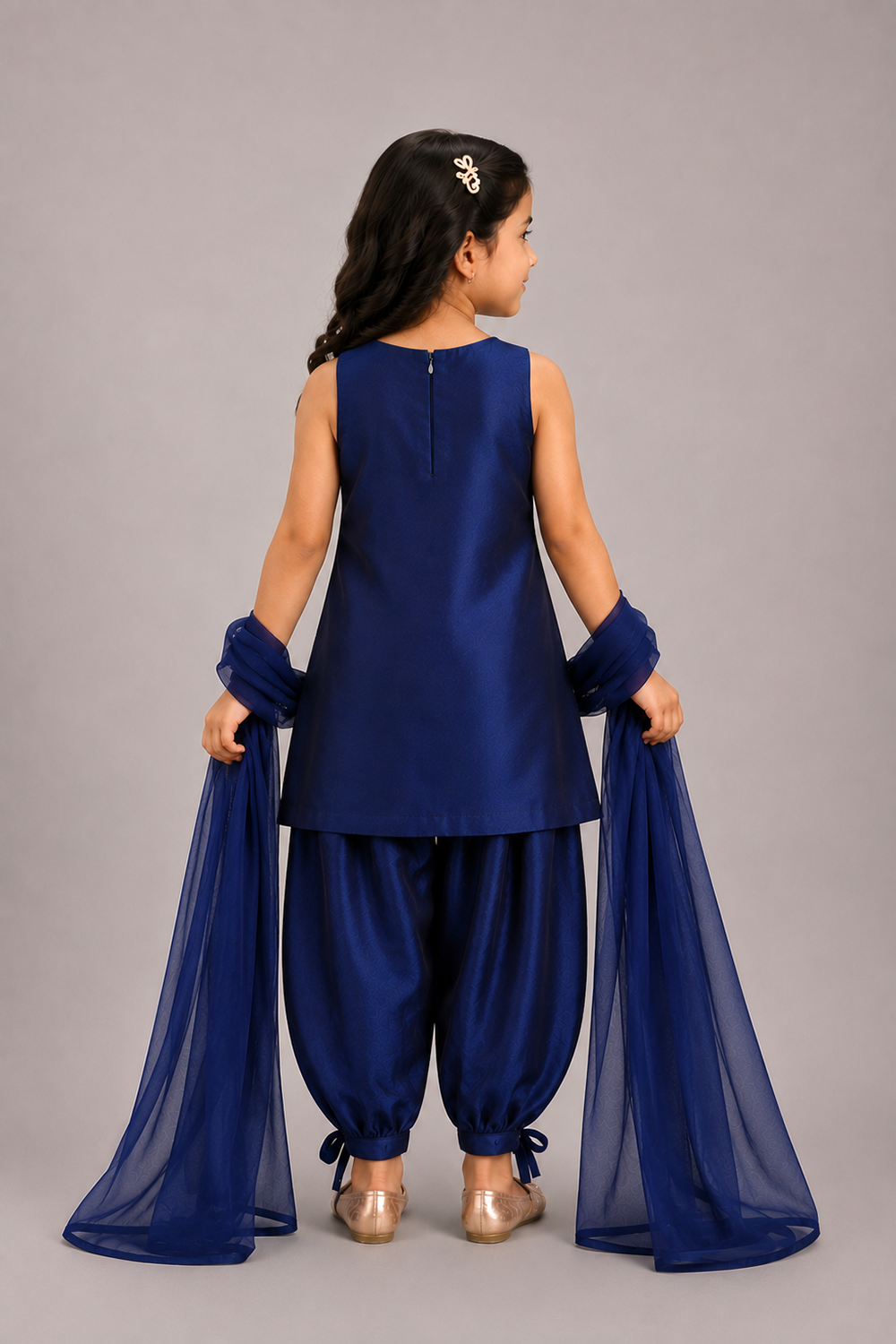 A Navy Blue Suit With Delicate Floral Embroidery And Paired With Tulip Pants