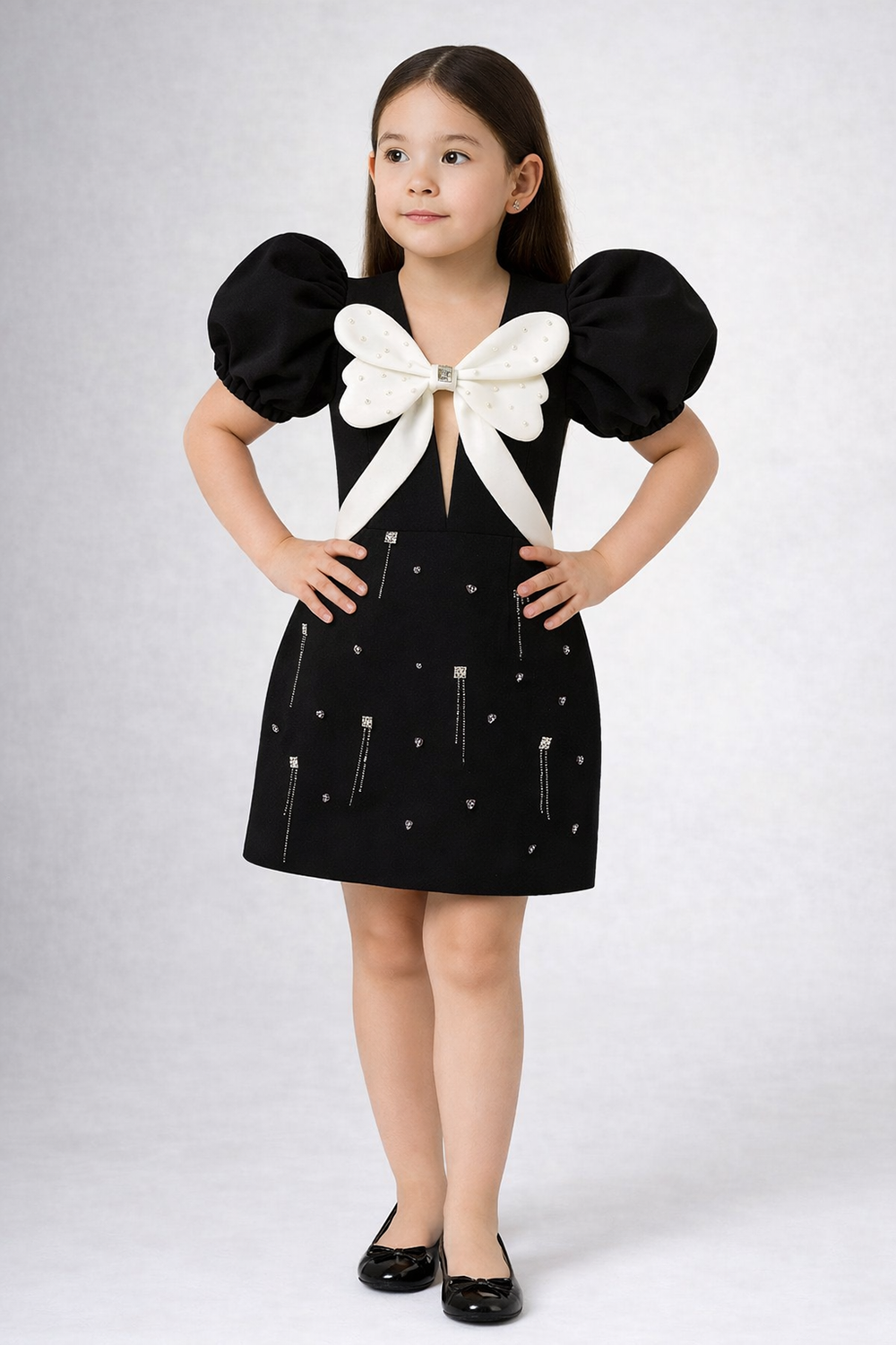 Black Dress with Bow Detailing and Stone Work