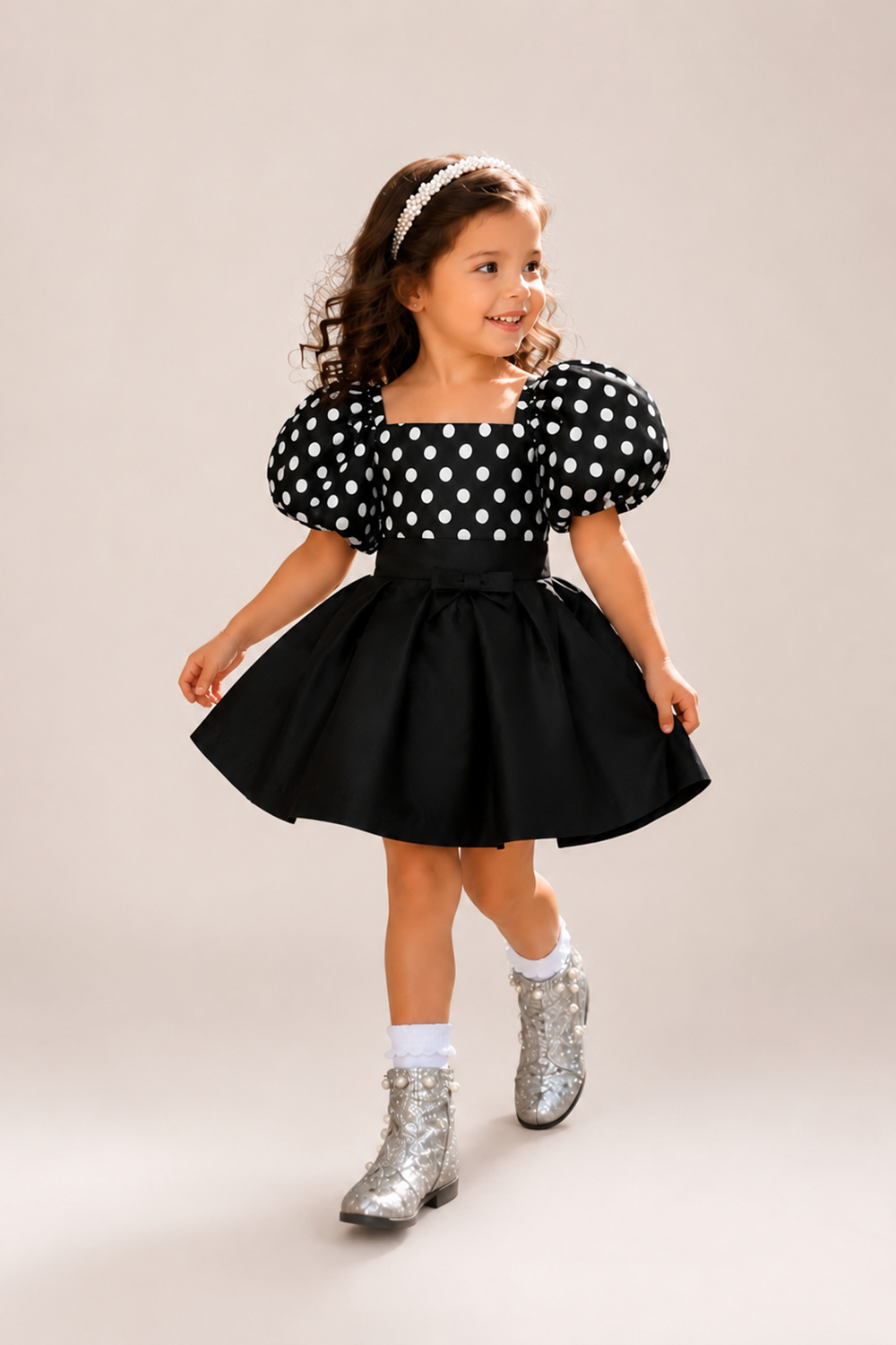 Black Polka Dot Top Paired With A Matching Flared Skirt