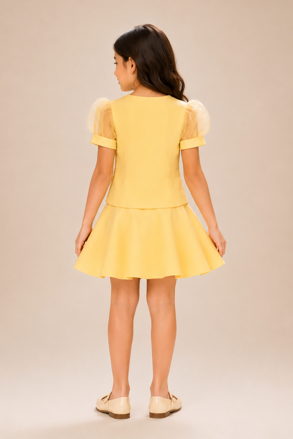 Butter Yellow Top Paired With A Matching Flared Skirt