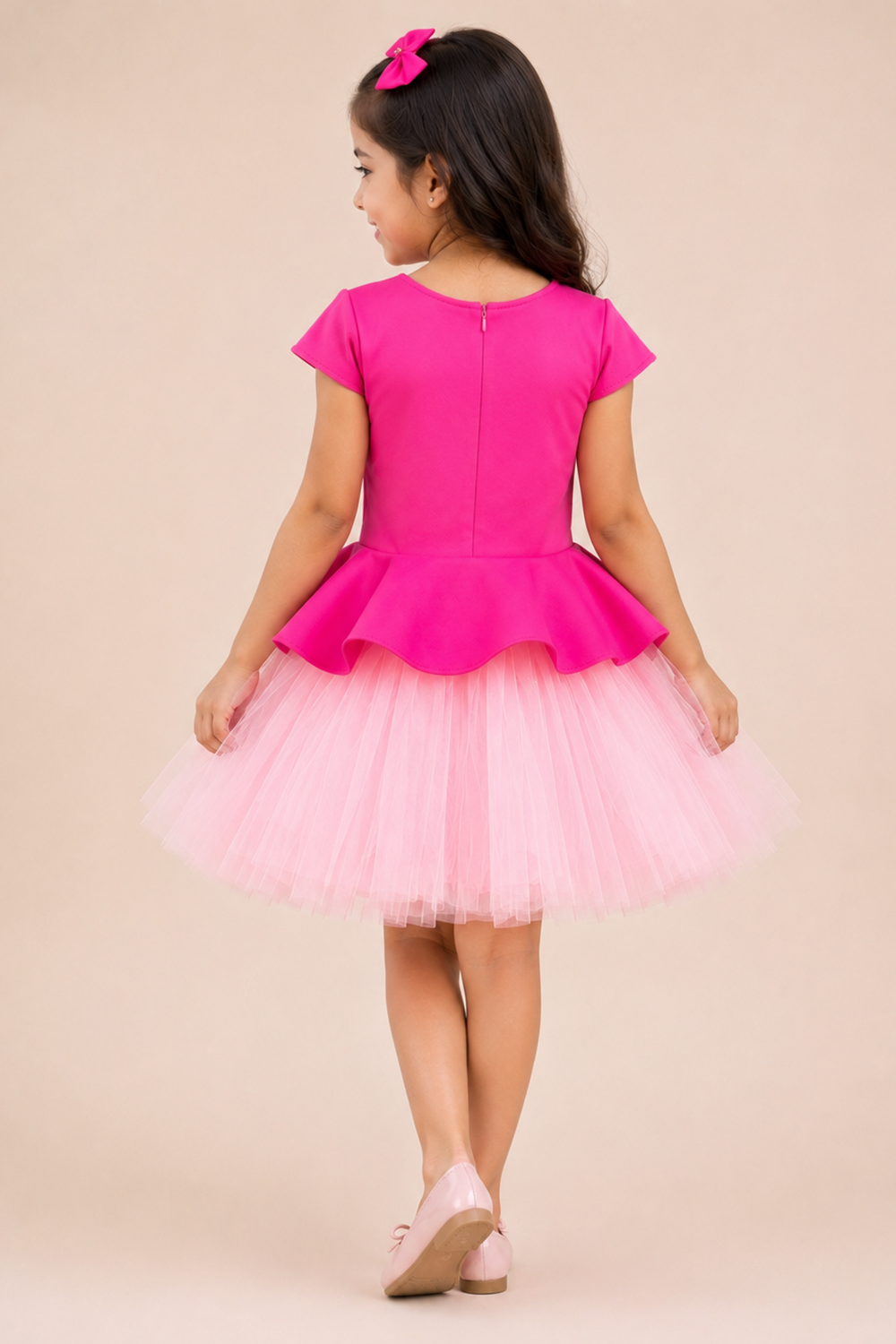 Hot Pink Peplum Dress With A Layered Tulle And Ruffle Detail