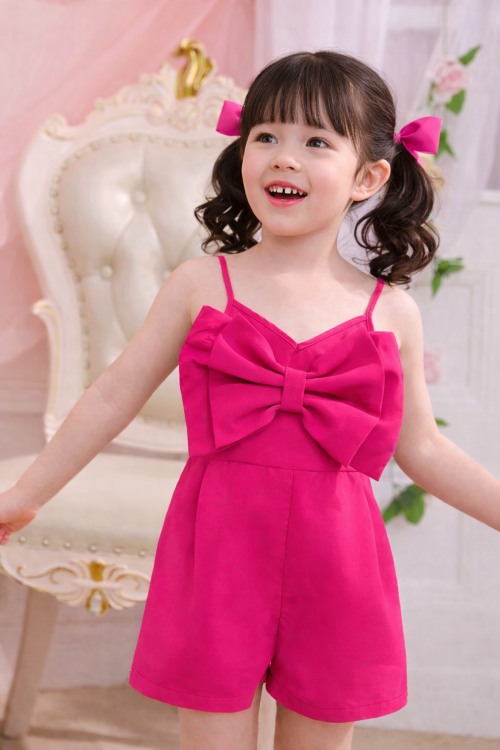 Pink Jumpsuit with Bow Detailing