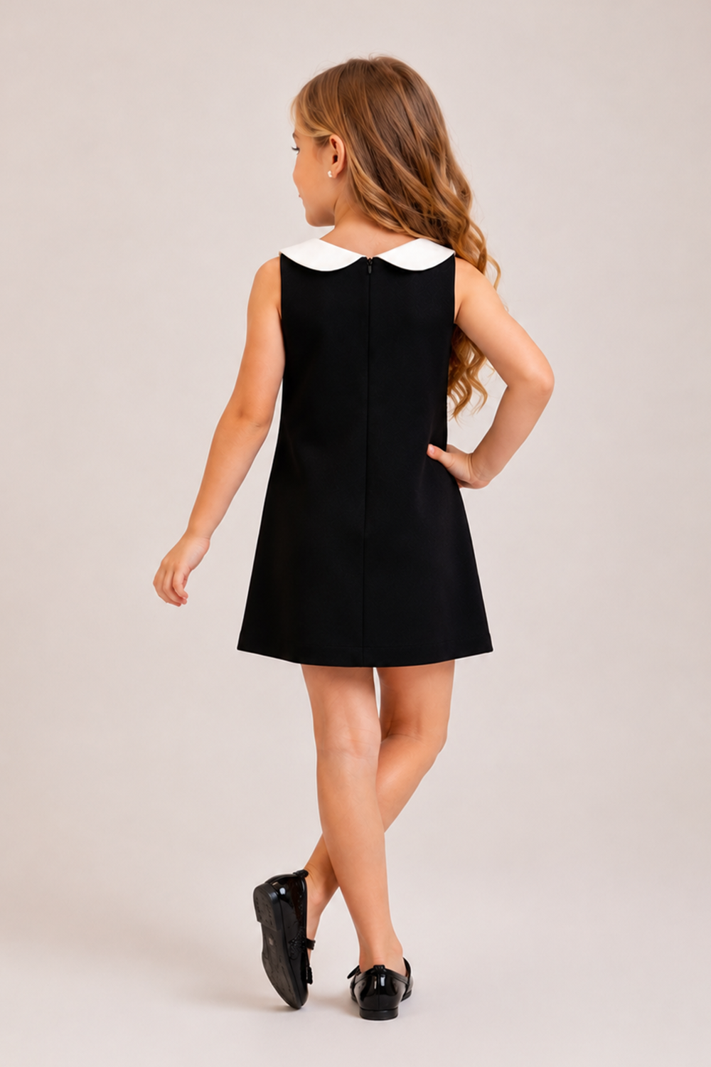 Sleeveless Black Dress With A Statement White Collar And 3D Floral Hem