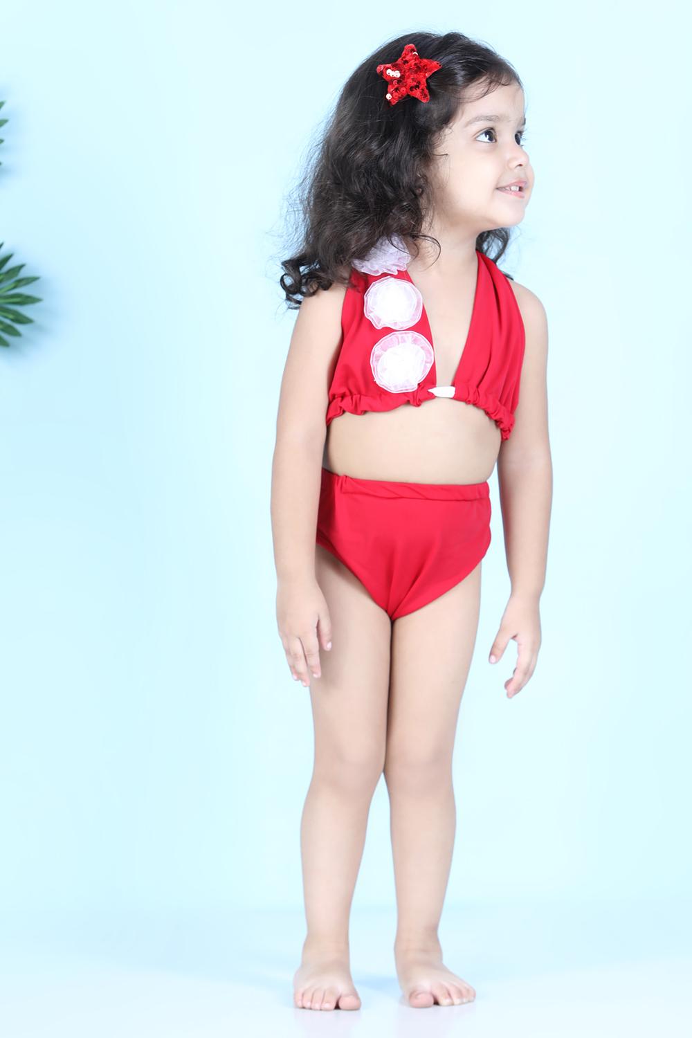 Two Piece Costume With Back Knot And Flower Detailing On Top