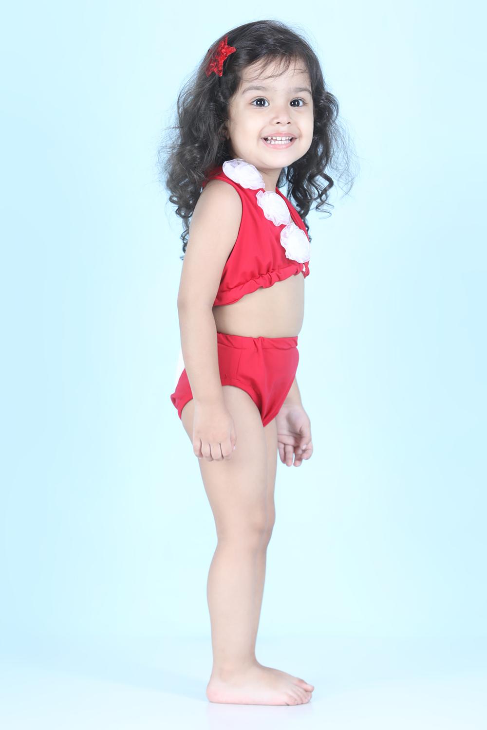 Two Piece Costume With Back Knot And Flower Detailing On Top