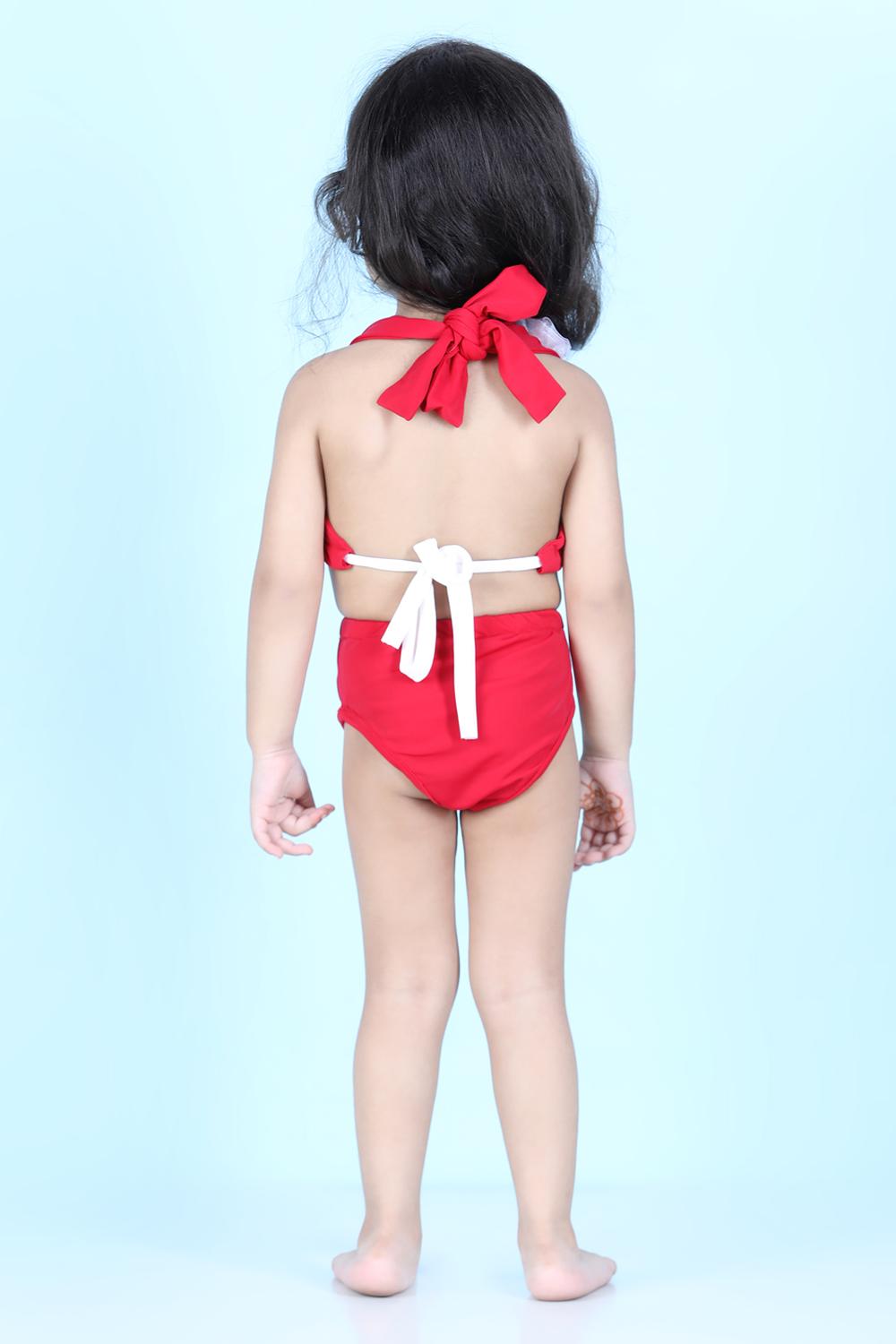 Two Piece Costume With Back Knot And Flower Detailing On Top
