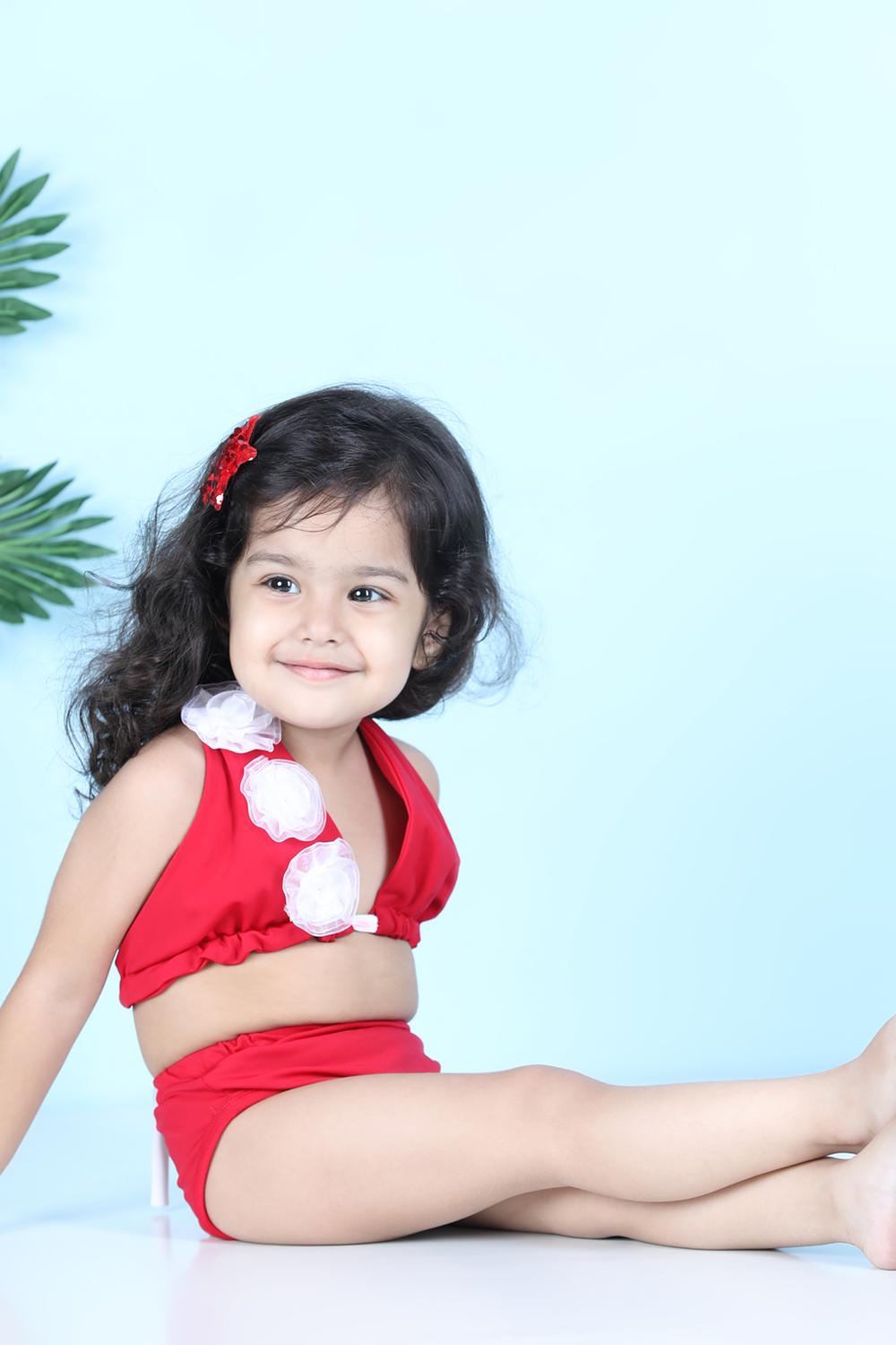 Two Piece Costume With Back Knot And Flower Detailing On Top