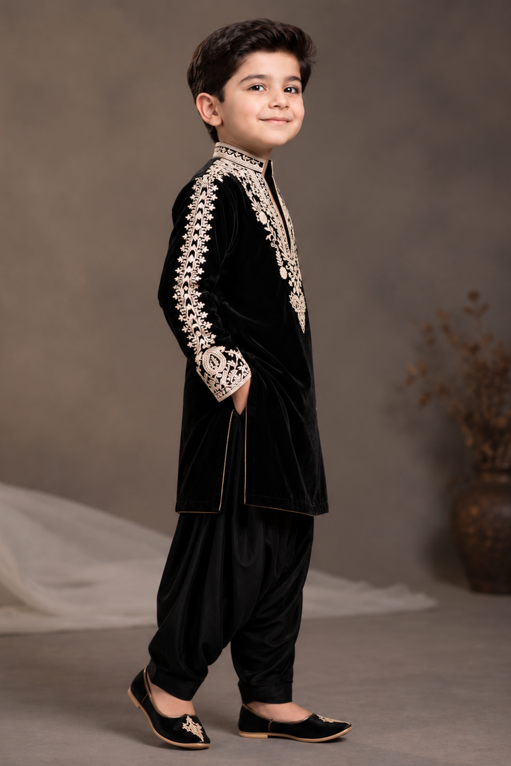 Black  Velvet Kurta  Set Featuring Inticate Golden Embroidery Paired With Classic Salwar