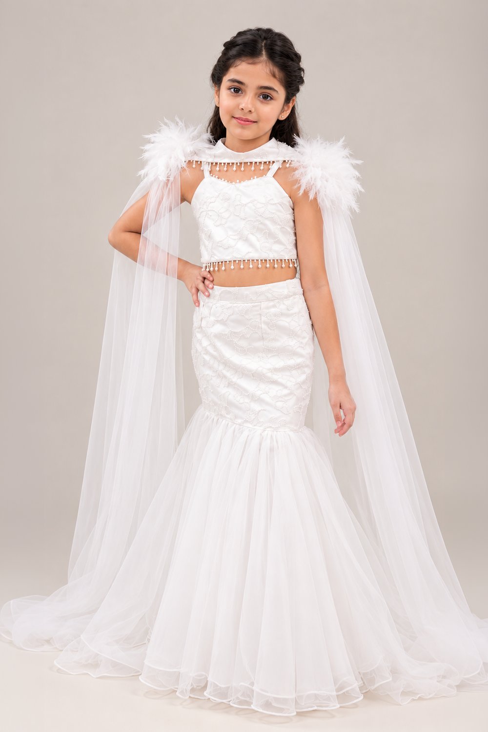 Elegant Fish Cut Lehenga Set Featuring Delicate Embroidery And Dramatic Fur Cape