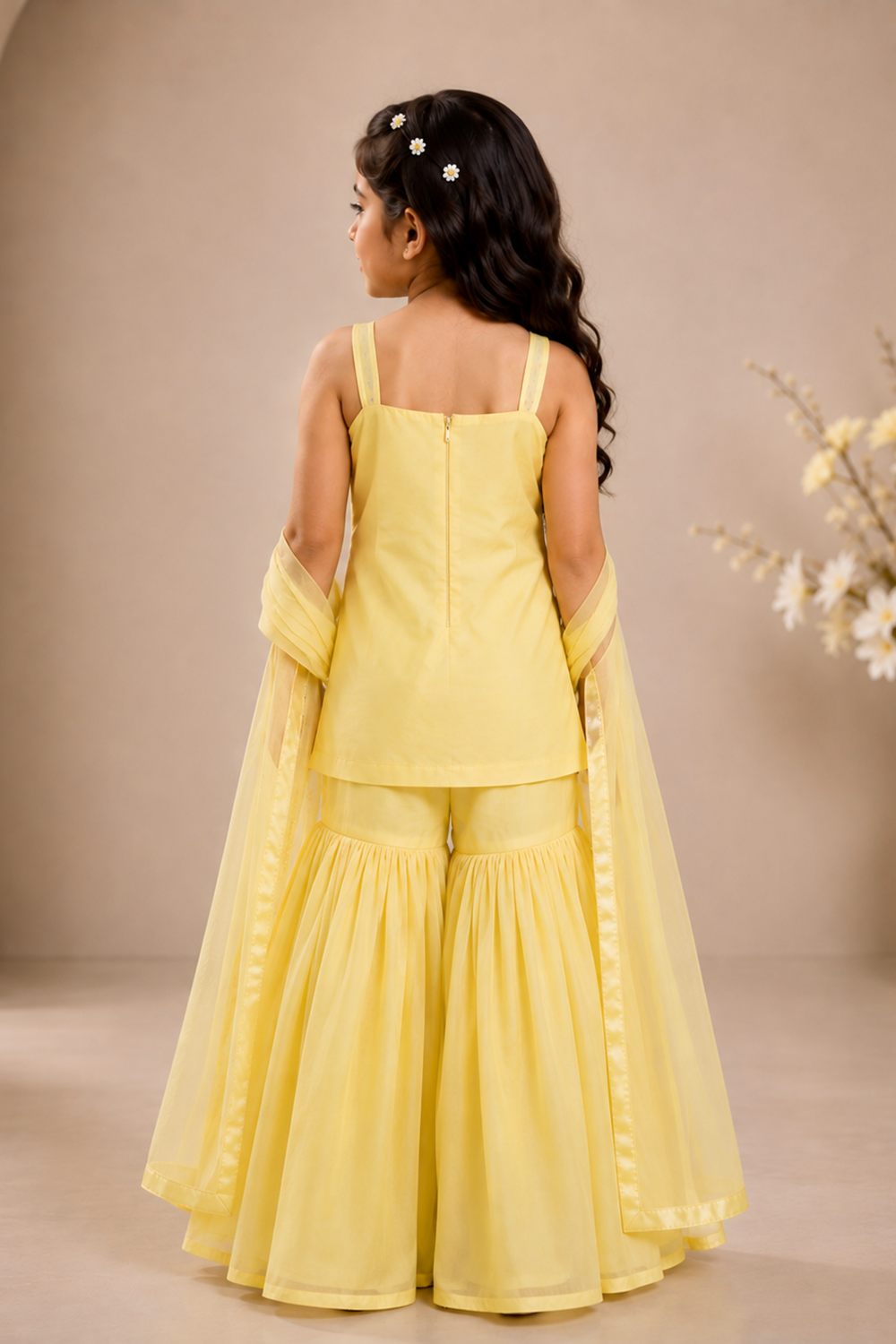 A Delicate Yellow Suit with Delicate Floral Embroidery and Paired with Gharara