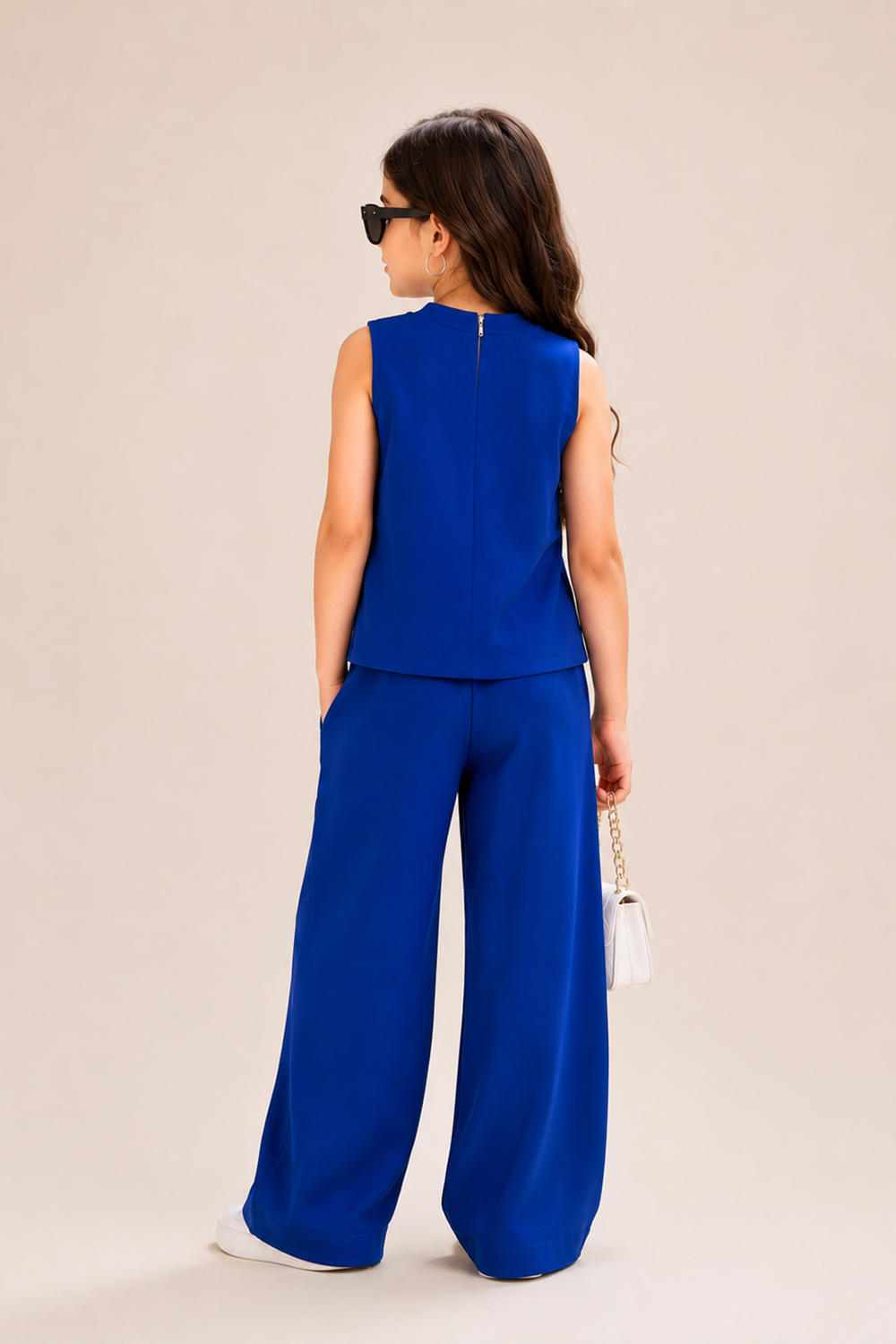 Top Paired With Matching Wide Lwg Pants And Bow Appliques